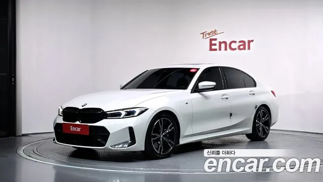 BMW 3-Series 2023 — photo 1