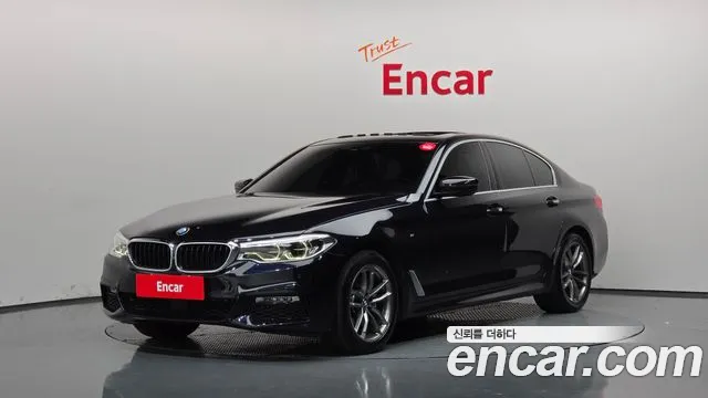 BMW 5-Series 2018 — photo 1