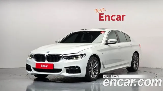 BMW 5-Series 2018 — photo 1
