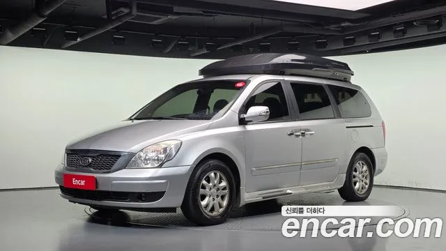 Kia Canival 2012 — photo 1