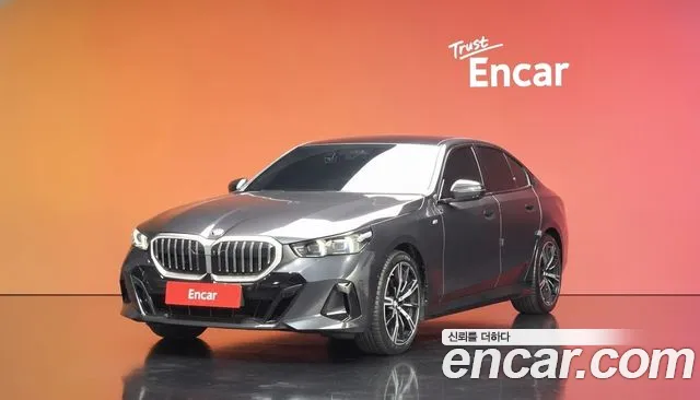 BMW 5-Series 2024 — photo 1