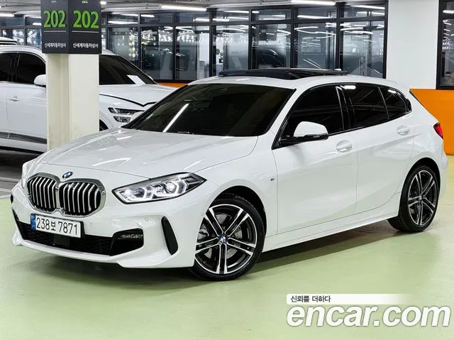 BMW 1-Series 2024 — photo 1
