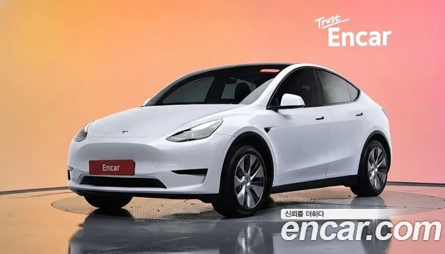 Tesla Model Y 2024 — photo 1