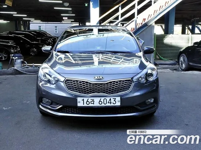 Kia K3 2013 — photo 1