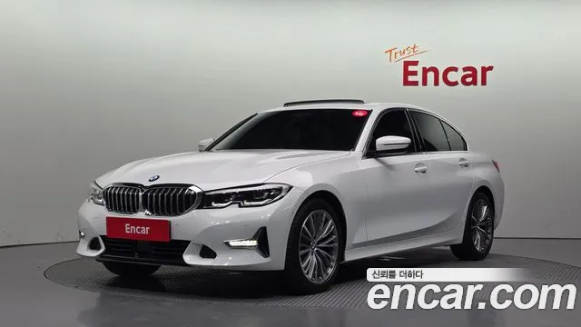 BMW 3-Series 2022 — photo 1