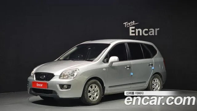 Kia Carens 2013 — photo 1