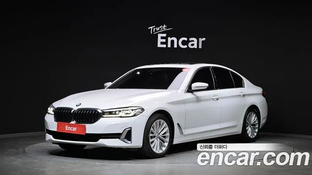 BMW 5-Series 2021 — photo 1