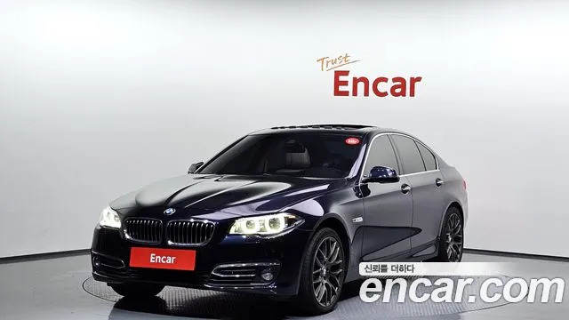 BMW 5-Series 2014 — photo 1