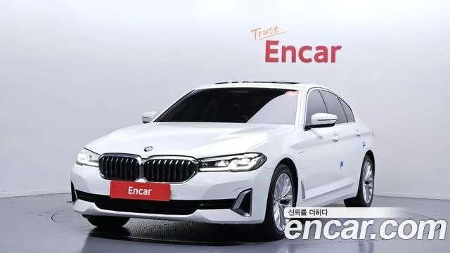 BMW 5-Series 2021 — photo 1