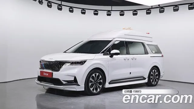 Kia Canival 2023 — photo 1