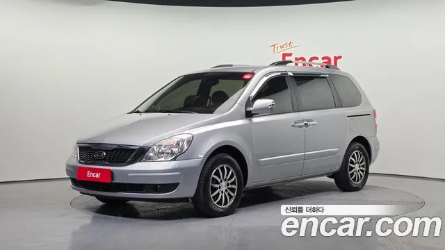Kia Canival 2010 — photo 1