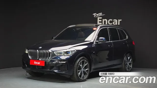 BMW X5 2022 — photo 1