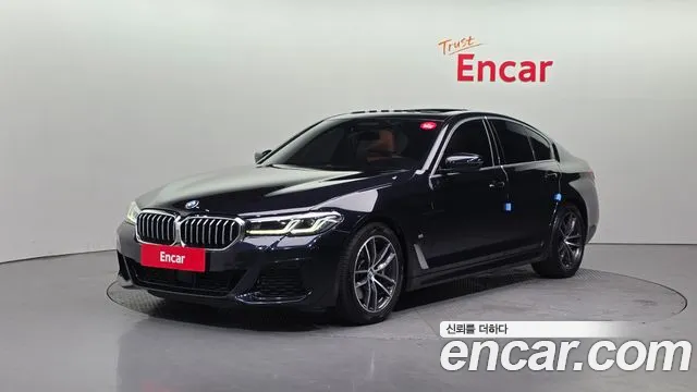 BMW 5-Series 2022 — photo 1