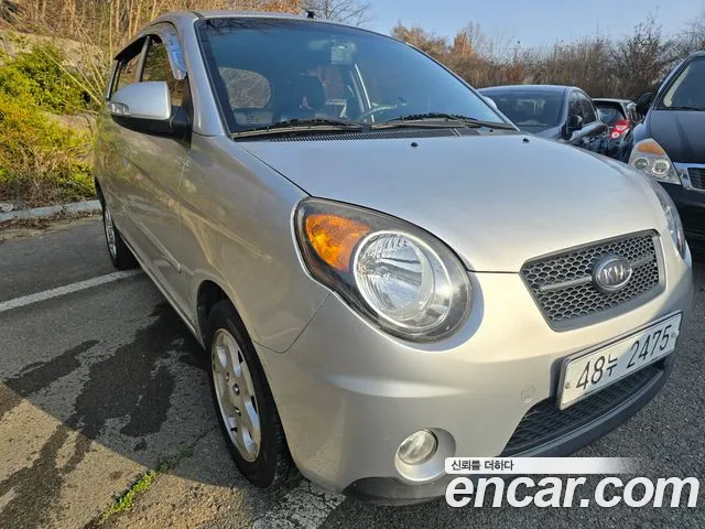 Kia morning 2009 — photo 1