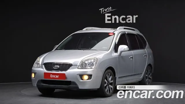 Kia Carens 2011 — photo 1