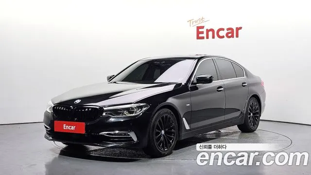 BMW 5-Series 2018 — photo 1