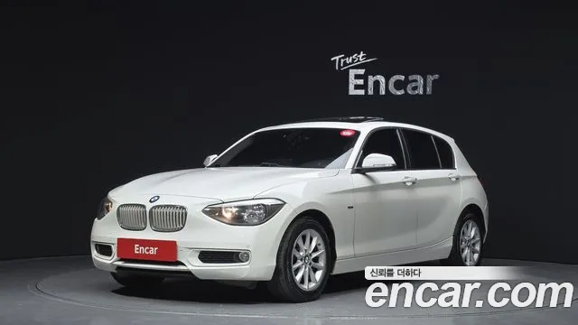 BMW 1-Series 2014 — photo 1