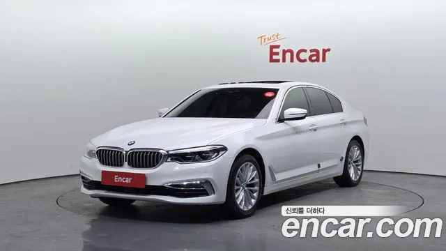 BMW 5-Series 2018 — photo 1