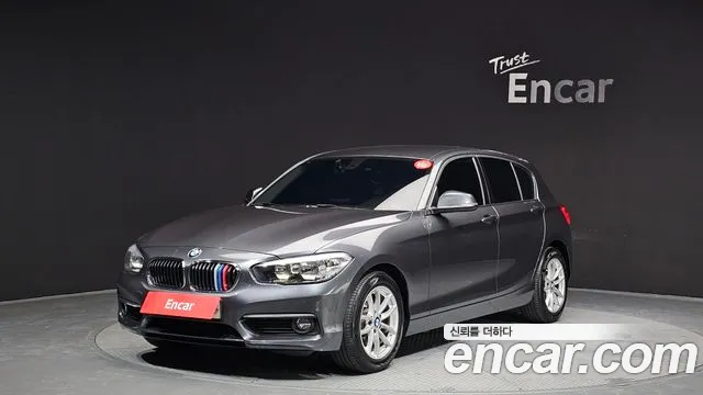 BMW 1-Series 2018 — photo 1