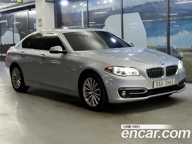 BMW 5-Series 2014 — photo 1