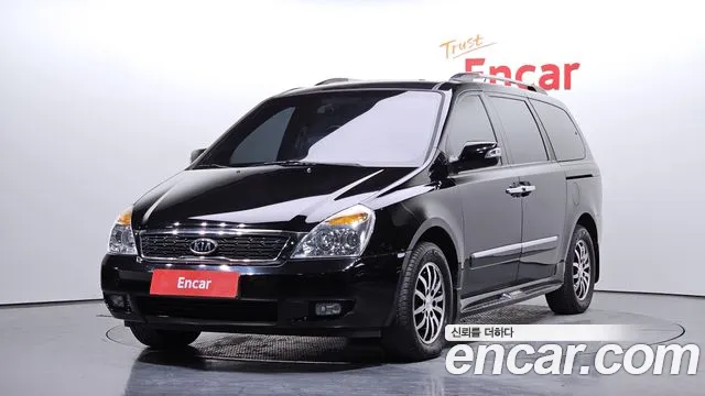 Kia Canival 2010 — photo 1