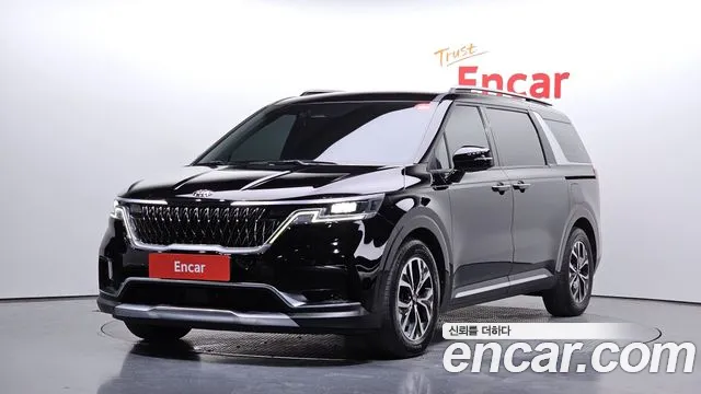 Kia Canival 2021 — photo 1