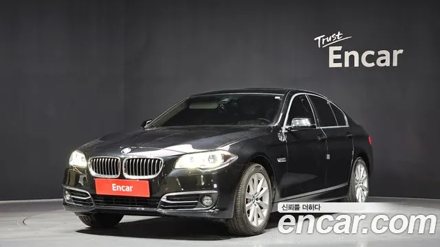 BMW 5-Series 2015 — photo 1