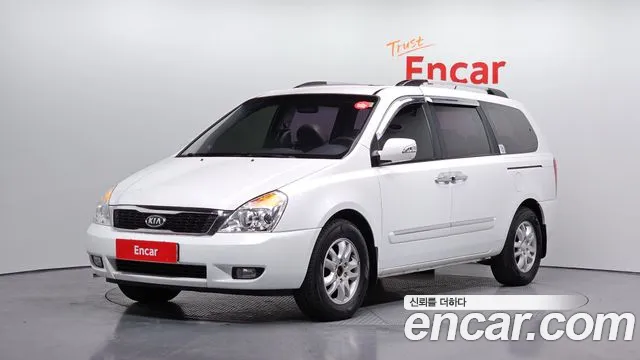 Kia Canival 2012 — photo 1