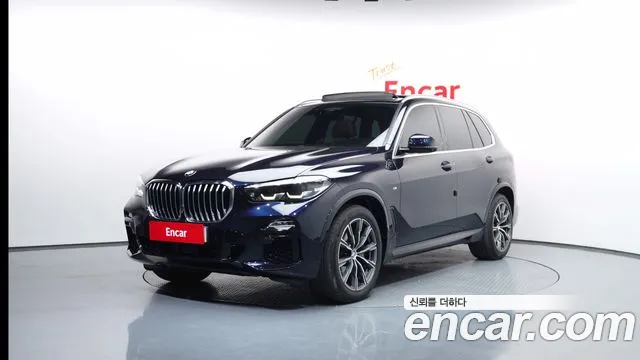 BMW X5 2021 — photo 1