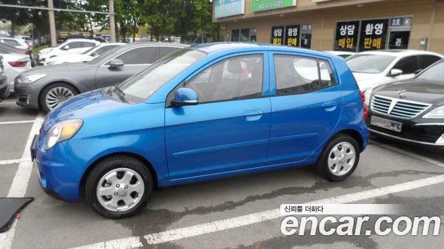 Kia morning 2011 — photo 1