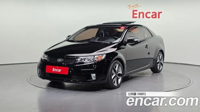 Kia Porte 2010 — photo 1