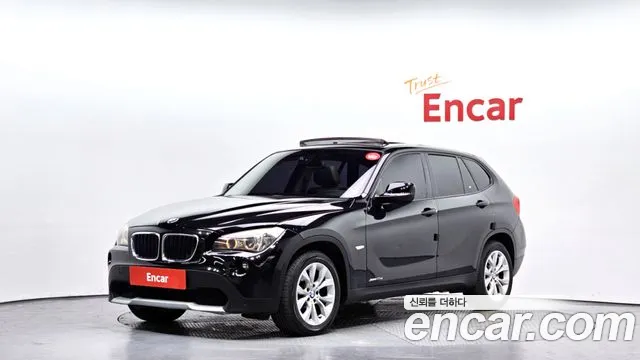 BMW X1 2010 — photo 1