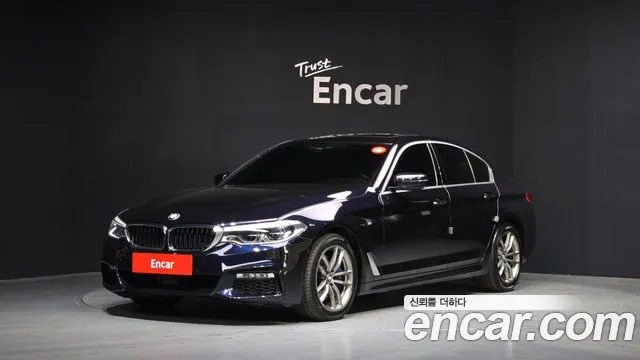 BMW 5-Series 2018 — photo 1