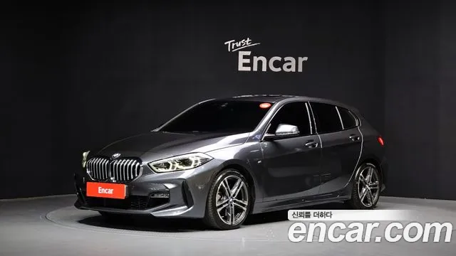 BMW 1-Series 2021 — photo 1