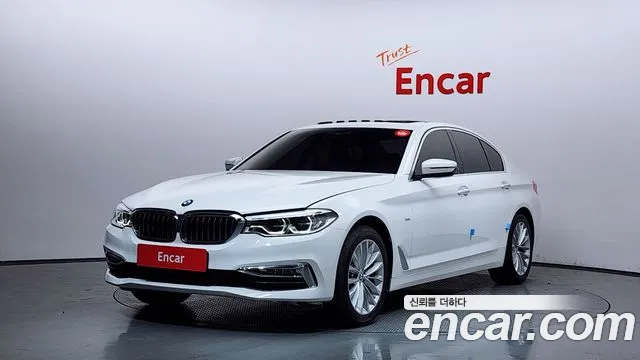 BMW 5-Series 2018 — photo 1