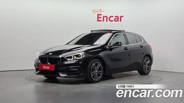 BMW 1-Series 2022 — photo 1