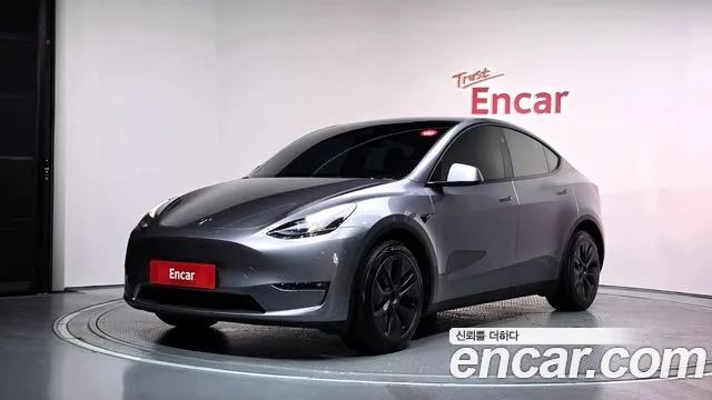 Tesla Model Y 2024 — photo 1