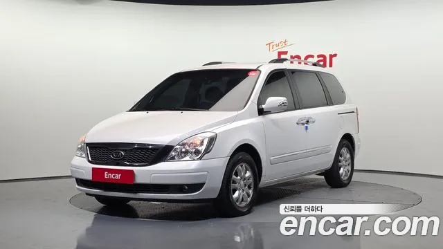 Kia Canival 2012 — photo 1