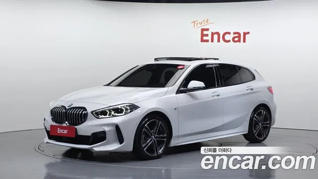 BMW 1-Series 2023 — photo 1