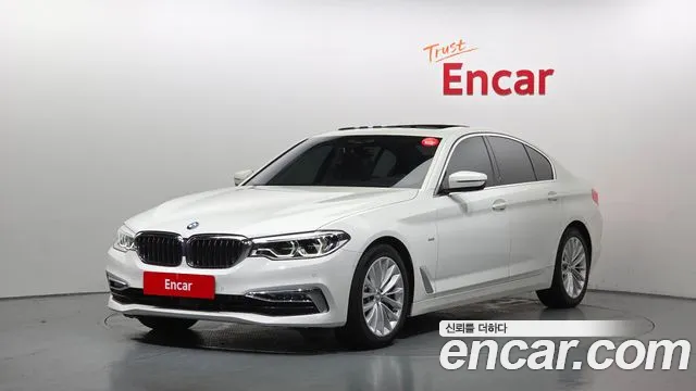 BMW 5-Series 2018 — photo 1