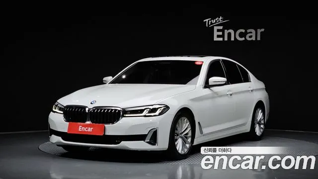 BMW 5-Series 2022 — photo 1