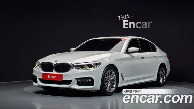 BMW 5-Series 2018 — photo 1