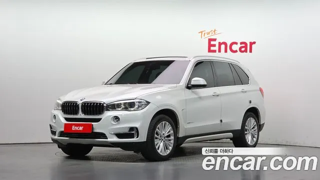 BMW X5 2014 — photo 1