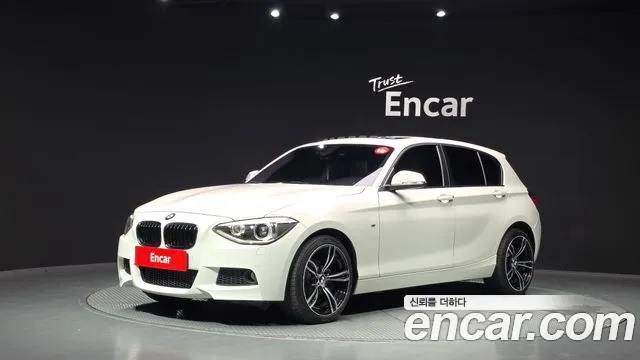 BMW 1-Series 2014 — photo 1