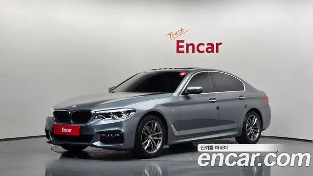 BMW 5-Series 2018 — photo 1