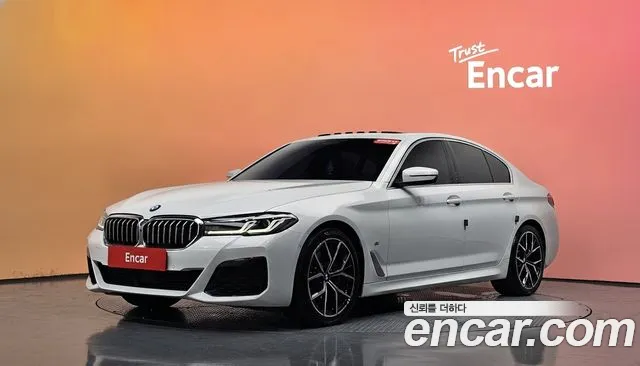 BMW 5-Series 2023 — photo 1