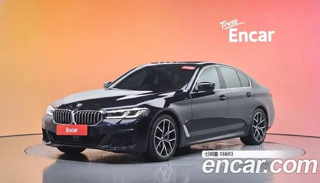 BMW 5-Series 2022 — photo 1