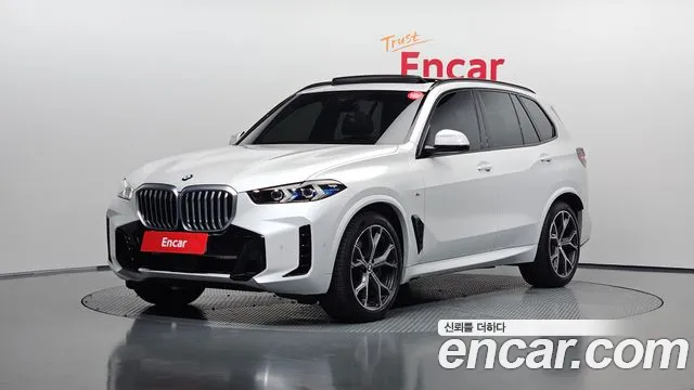 BMW X5 2024 — photo 1