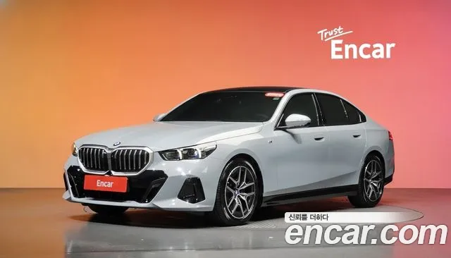 BMW 5-Series 2024 — photo 1