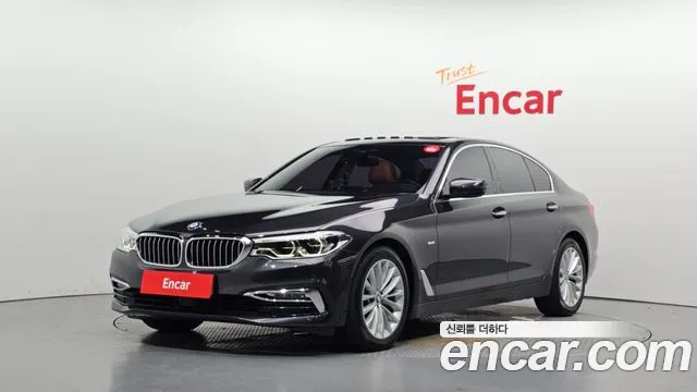 BMW 5-Series 2018 — photo 1